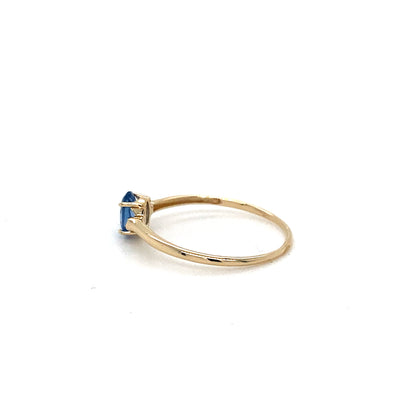 14K Gold Ring with Vibrant Swiss Blue Topaz