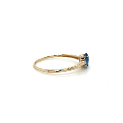 14K Gold Ring with Vibrant Swiss Blue Topaz